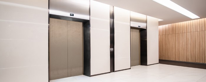 电梯缓冲器距离标准是什么(电梯顶层缓冲距离)