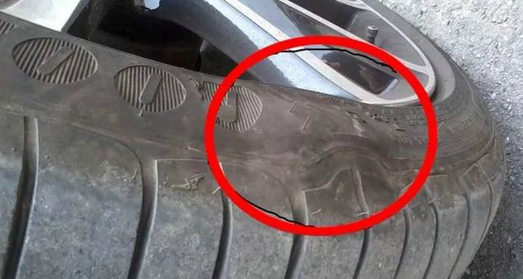 轮胎侧面鼓包是什么原因导致的(轮胎侧面鼓包有没有问题)